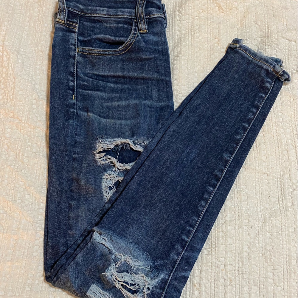 Distressed high rise/waist jegging